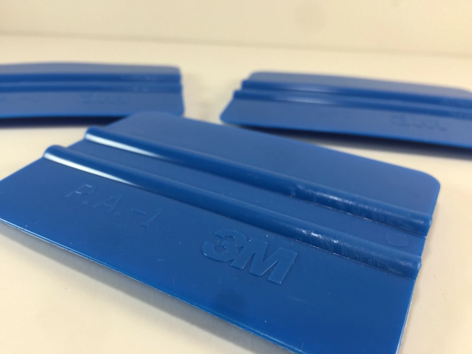 Three 3M PA1-B vinyl applicator squeegees view 2